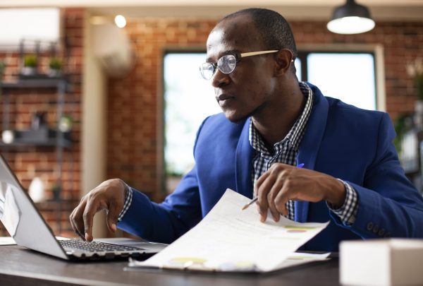 Entrepreneur checking business analytics